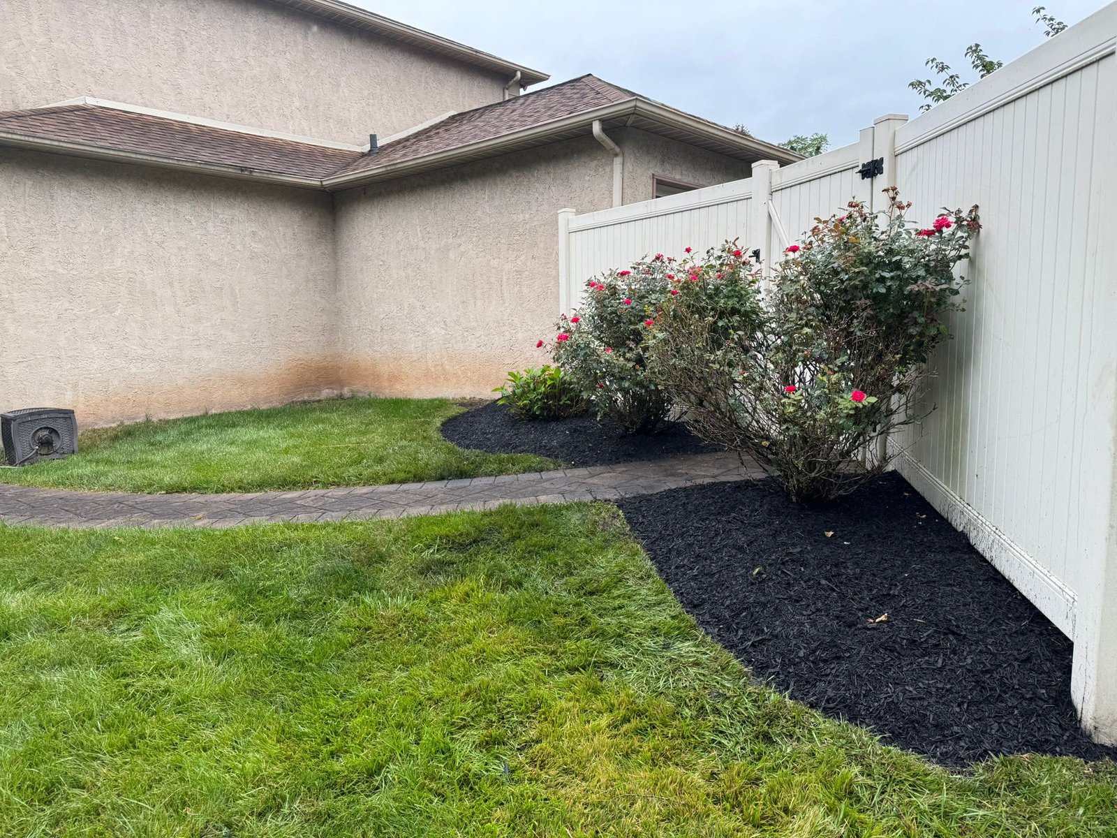 Mulch installation work by Green Force Property Services